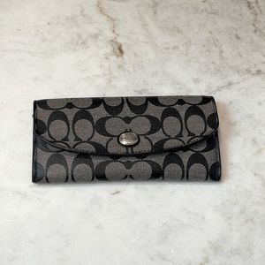 Black and grey coach leather wallet